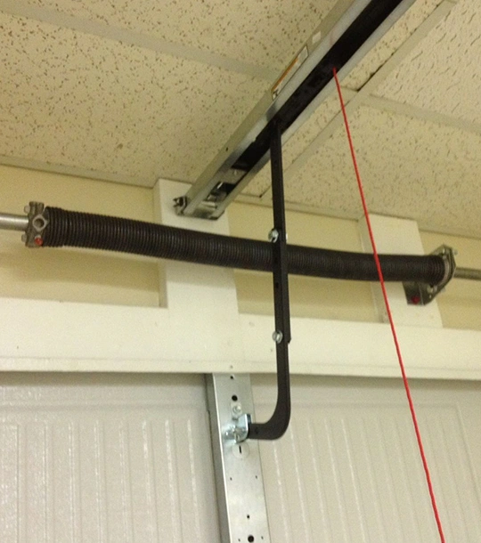 Garage Torsion Springs Installation in Roswell 4 Skilled technicians fix broken torsion springs, restoring garage door function, balance, and long-term safety.